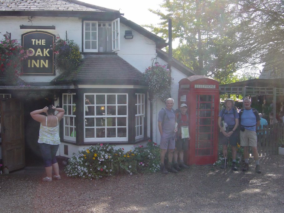 Outside the Oak Inn with a small reminder off our roots